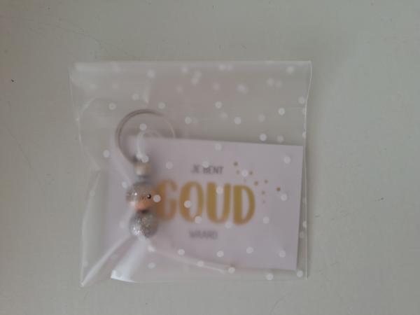 Gelukspoppetje goud waard